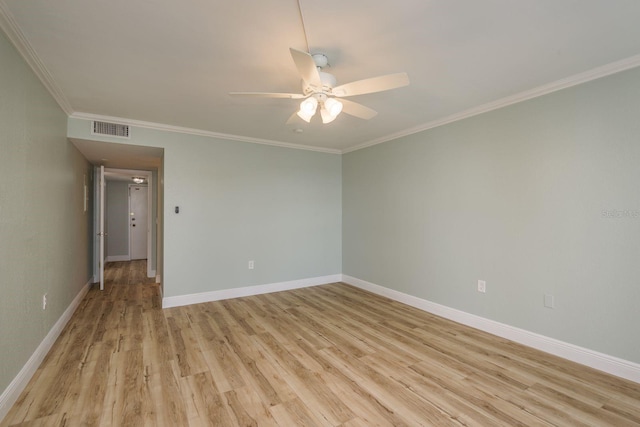 unfurnished room featuring baseboards, visible vents, ceiling fan, crown molding, and light wood-style floors