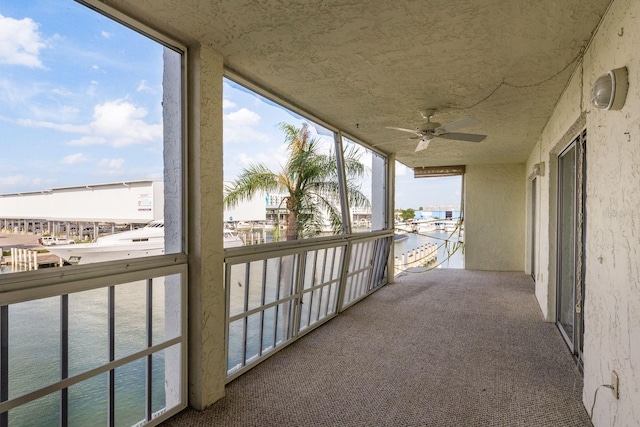 balcony featuring ceiling fan