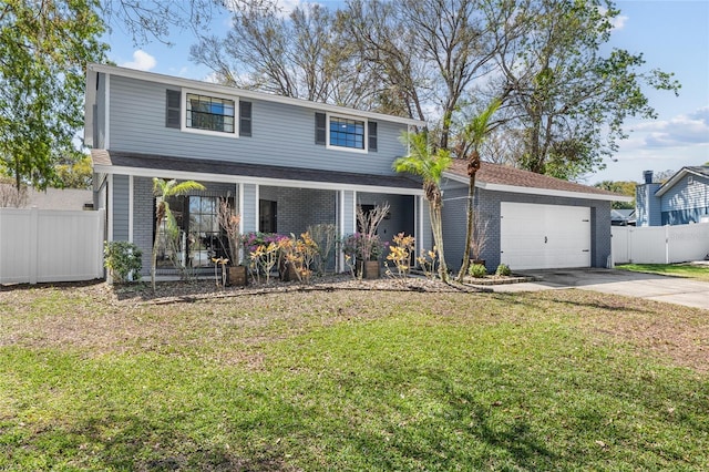 traditional-style home featuring a garage, brick siding, concrete driveway, fence, and a front yard