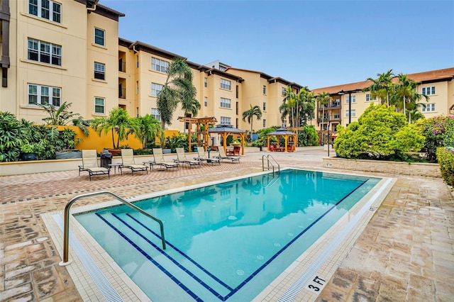 view of swimming pool featuring a patio