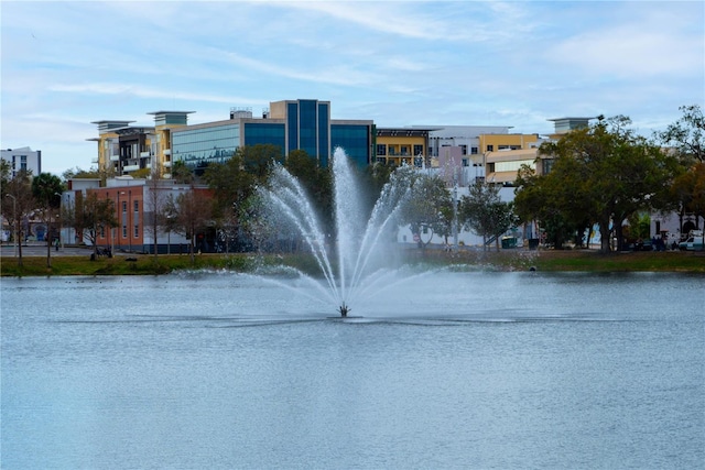 surrounding community with a water view