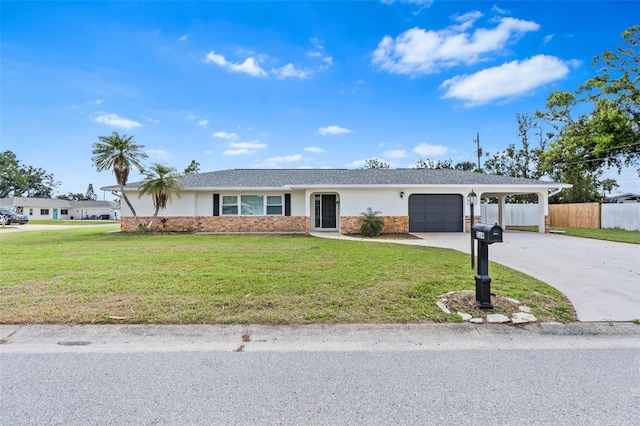 single story home with a garage, fence, concrete driveway, and a front yard