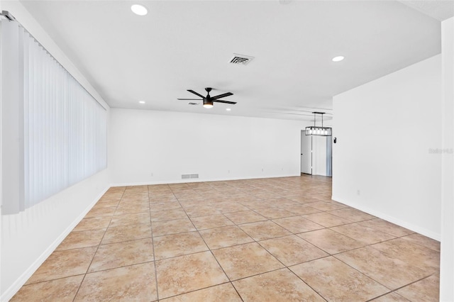 empty room with recessed lighting, ceiling fan, visible vents, and light tile patterned flooring