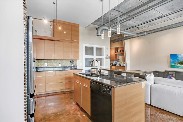 kitchen with finished concrete flooring, light brown cabinetry, open floor plan, a sink, and dishwasher