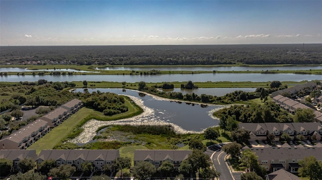 bird's eye view featuring a water view and a residential view