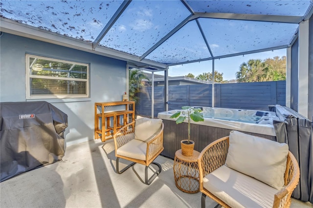 sunroom / solarium with a jacuzzi