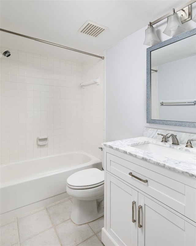 full bath with bathing tub / shower combination, visible vents, toilet, vanity, and tile patterned flooring