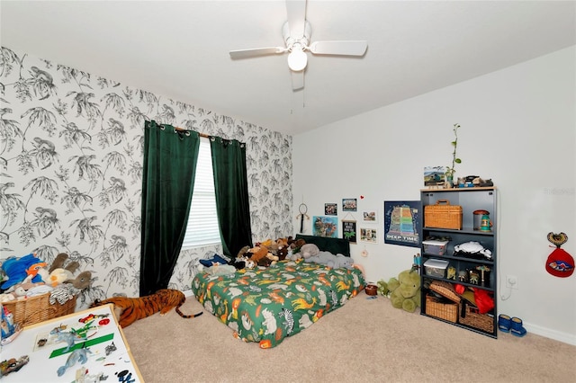 bedroom with carpet, a ceiling fan, and wallpapered walls