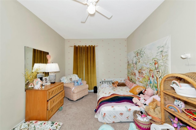 bedroom featuring ceiling fan, wallpapered walls, and light colored carpet