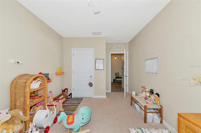 game room featuring light colored carpet, visible vents, and baseboards