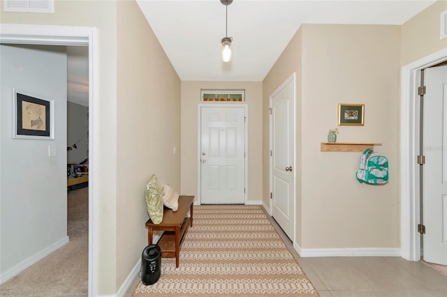 entrance foyer with visible vents and baseboards