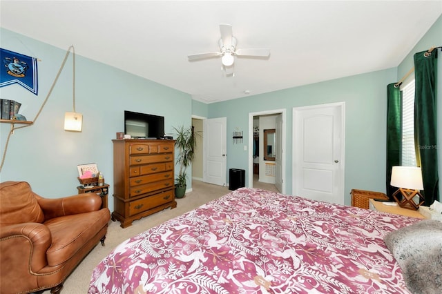 carpeted bedroom featuring a ceiling fan