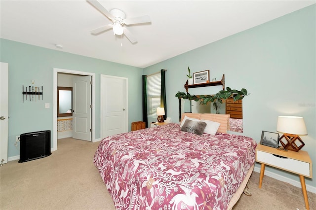 bedroom with light carpet, a ceiling fan, and baseboards