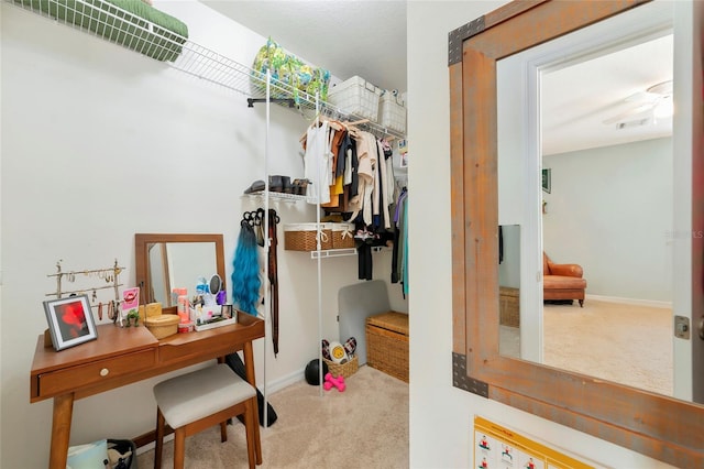 spacious closet featuring carpet floors