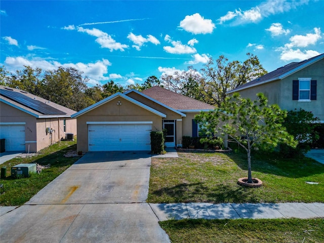 view of front of house featuring stucco siding, concrete driveway, an attached garage, a front yard, and central AC