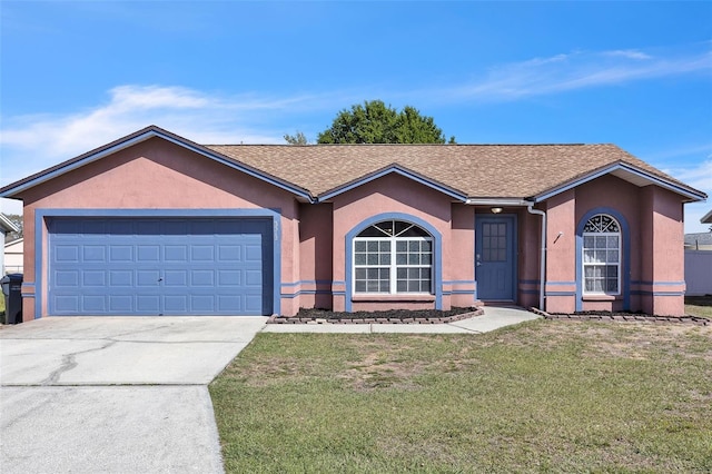 ranch-style house with driveway, an attached garage, a front lawn, and stucco siding