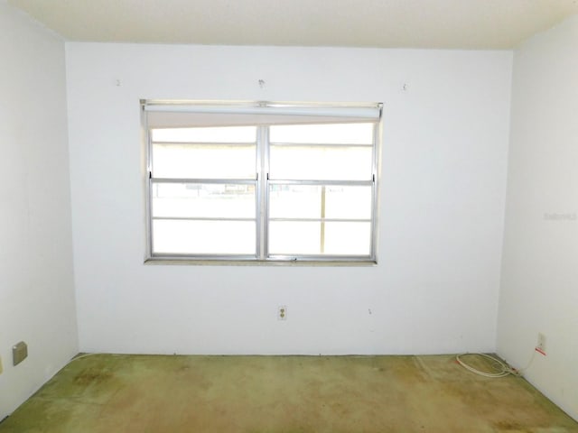 empty room featuring carpet flooring