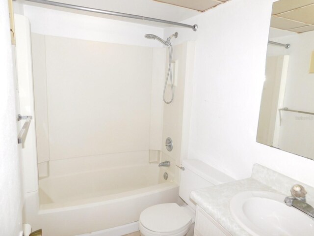 full bath with washtub / shower combination, vanity, and toilet