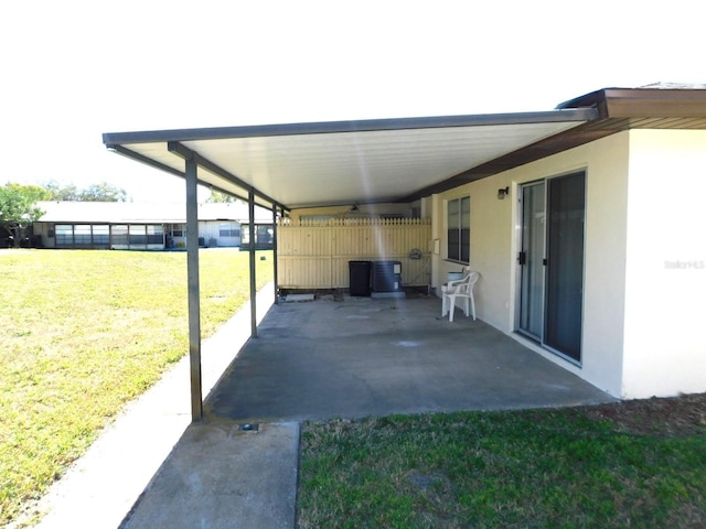 view of patio / terrace featuring fence