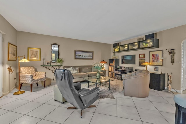 living area featuring light tile patterned floors