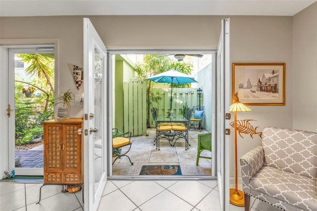 entryway with tile patterned floors