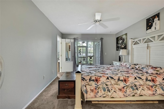 carpeted bedroom with access to exterior, ceiling fan, and baseboards