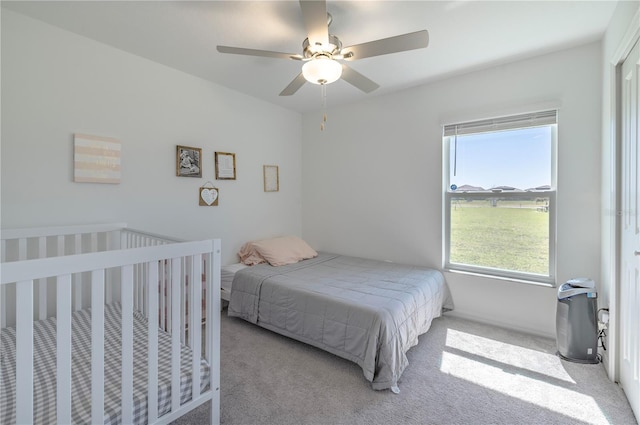 bedroom featuring carpet and ceiling fan