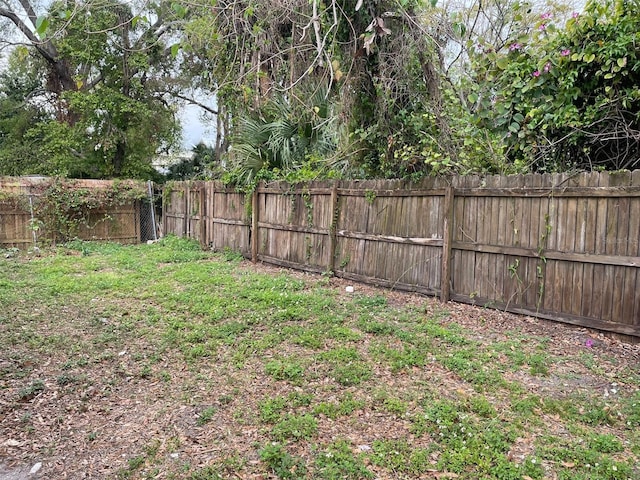 view of yard featuring a fenced backyard