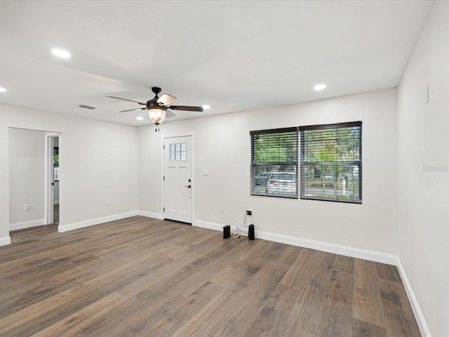 unfurnished room featuring visible vents, a ceiling fan, wood finished floors, recessed lighting, and baseboards