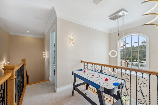 rec room featuring crown molding, carpet, visible vents, and baseboards