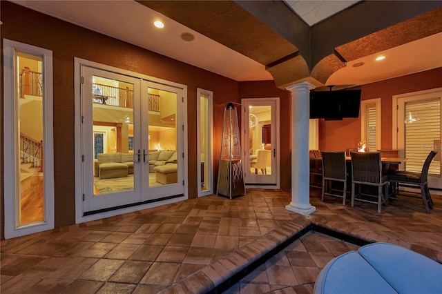 view of patio / terrace with outdoor dining area and french doors