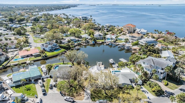 bird's eye view with a residential view and a water view