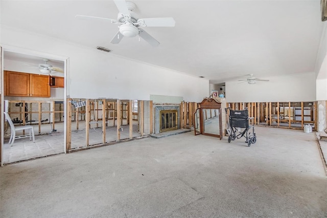 unfurnished living room featuring ceiling fan and visible vents