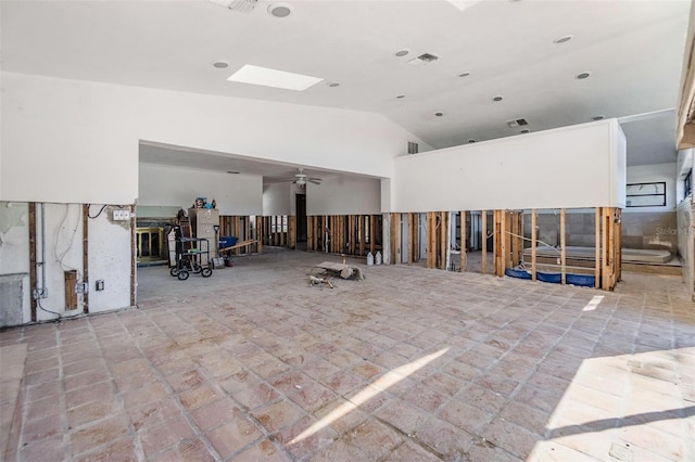 miscellaneous room with vaulted ceiling with skylight and visible vents