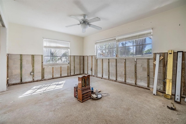 unfurnished room with a ceiling fan