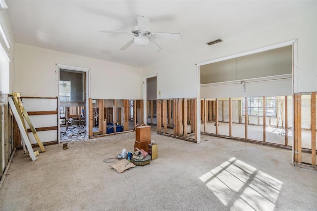 unfurnished room with a ceiling fan and visible vents