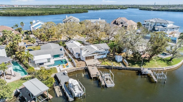 drone / aerial view with a water view