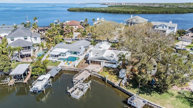 aerial view featuring a water view and a residential view