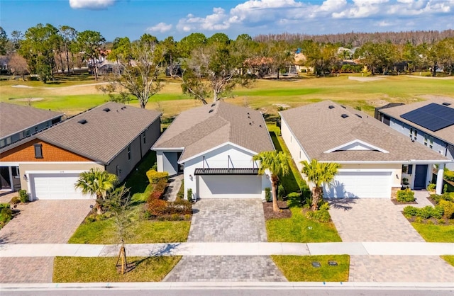 birds eye view of property with a residential view