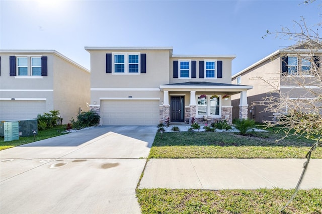 view of front facade with driveway, a garage, stone siding, a porch, and stucco siding