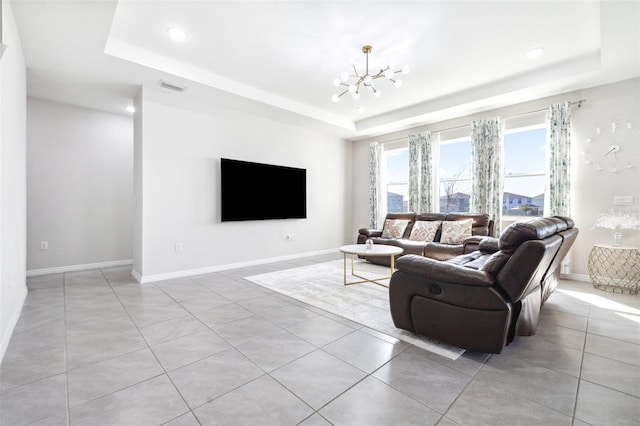 9119 Forge Breeze Loop, Wesley Chapel, FL 33545 - living area with a raised ceiling, a chandelier, light tile patterned floors, recessed lighting, and baseboards