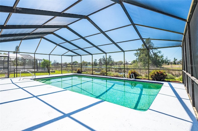 outdoor pool featuring a patio and a lanai