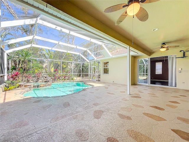 pool featuring a lanai, a patio area, and ceiling fan