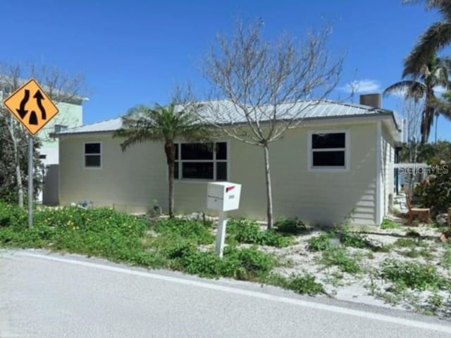 view of front of home featuring metal roof