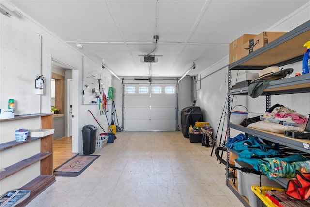 garage featuring a garage door opener