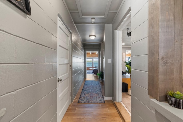 hallway with wood finished floors