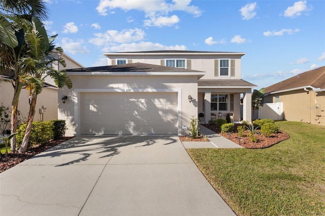 view of front of property featuring stucco siding, an attached garage, fence, driveway, and a front lawn