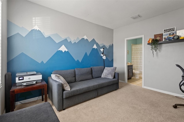 living area featuring carpet, visible vents, and baseboards