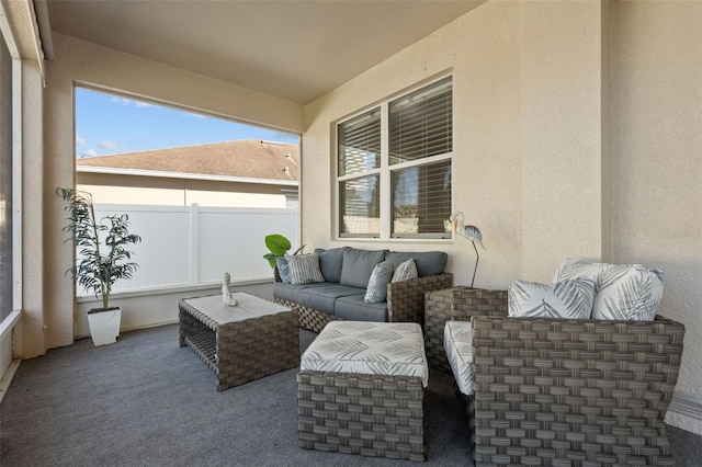 view of patio / terrace with outdoor lounge area and fence