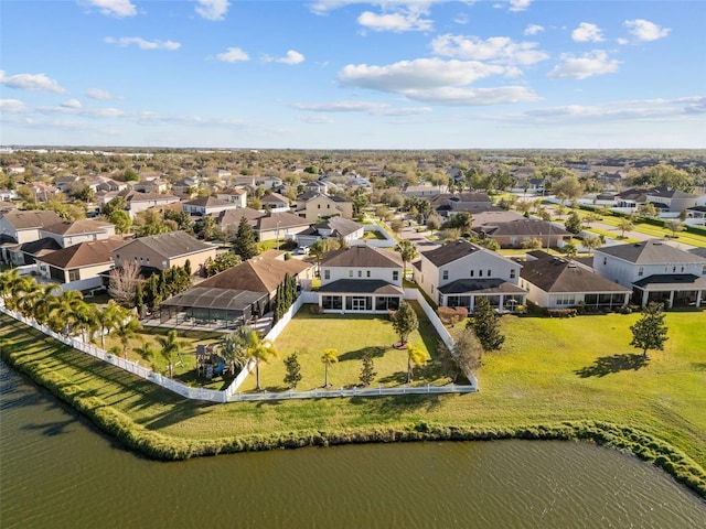 aerial view with a water view and a residential view